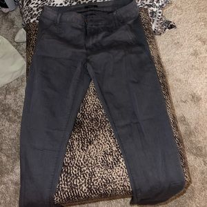 Grey jeans with hardware on back